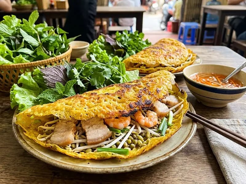Bánh Xèo (Vietnamese Sizzling Crêpes) with rice flour, turmeric and coconut milk — Vietnam recipe