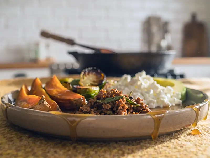 Fall Veggie Hot Honey Bowl with sweet potatoes, Brussels sprouts and lean ground turkey — USA recipe