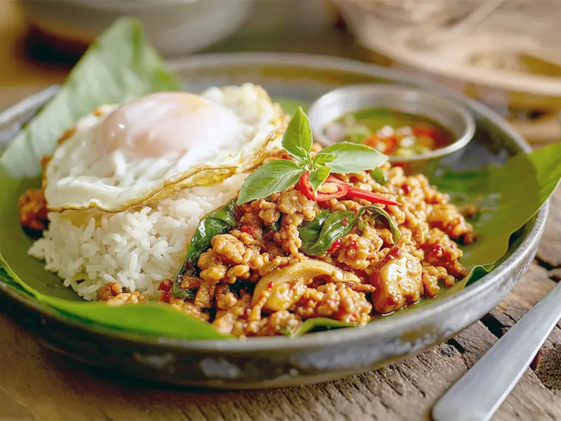 Pad Kra Pao (Thai Basil Chicken) with chicken, basil and garlic — Thailand recipe