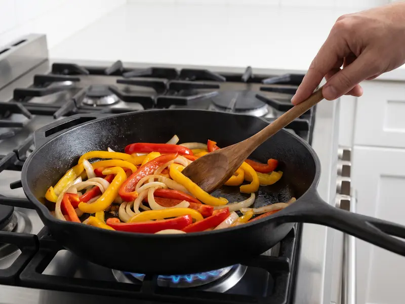 Onions and peppers softened in the sausage pan, still holding their shape