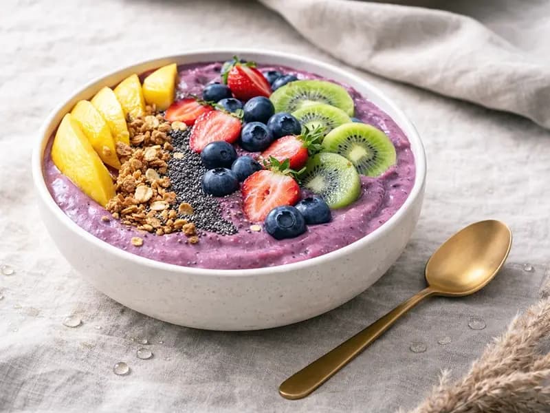 Mango Berry Smoothie Bowl with frozen mango chunks, frozen mixed berries and Greek yogurt — USA recipe